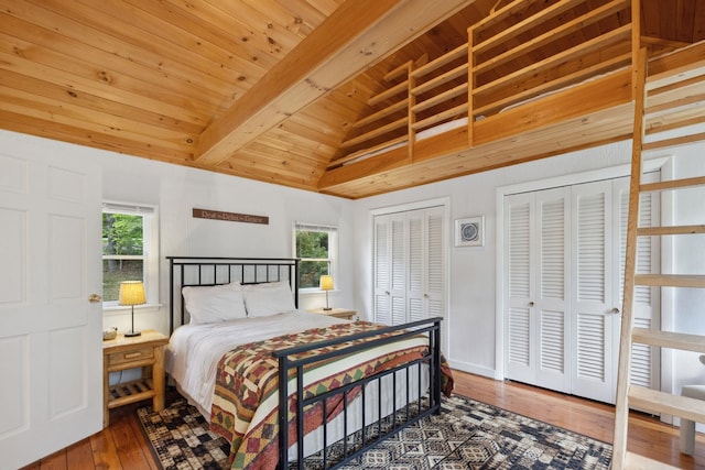 46 Crestwood Dr, Conway, NH 03860 - bedroom with two closets, hardwood / wood-style flooring, and wooden ceiling