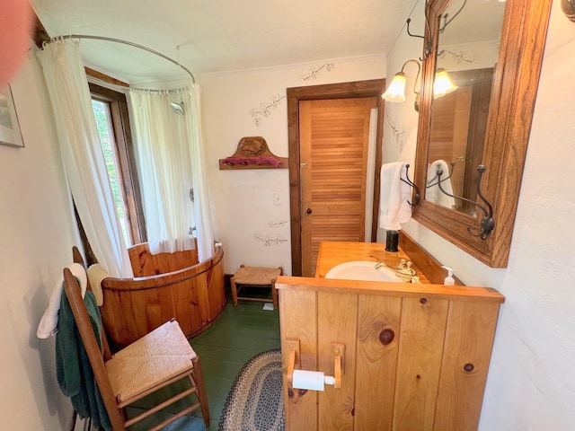 133 Ben Dexter Rd, Topsham, VT 05076 - bathroom featuring vanity and ornamental molding