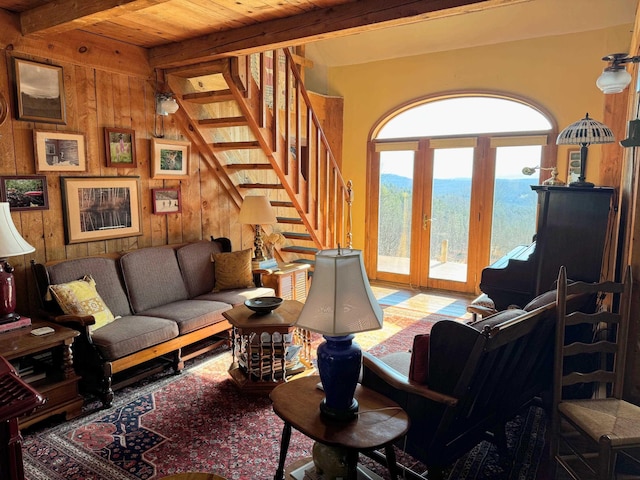 133 Ben Dexter Rd, Topsham, VT 05076 - living room with beam ceiling, stairway, wooden ceiling, and wooden walls