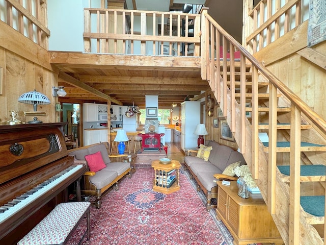 133 Ben Dexter Rd, Topsham, VT 05076 - living room with wooden walls, stairway, wooden ceiling, and beamed ceiling