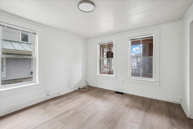 16 Shurtleff Pl, Barre City, VT 05641 - spare room with wood finished floors and baseboards