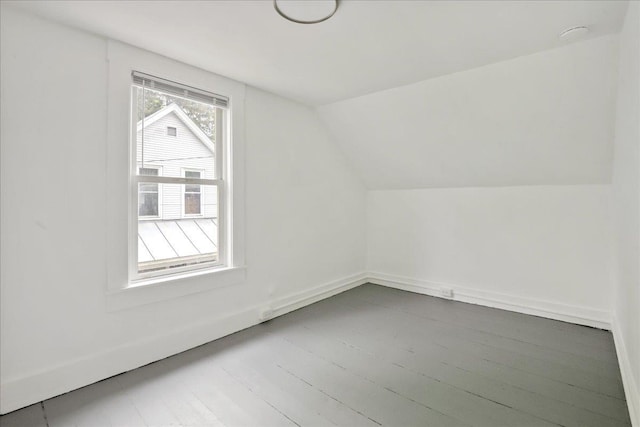 16 Shurtleff Pl, Barre City, VT 05641 - bonus room with lofted ceiling, baseboards, and wood finished floors