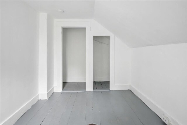 16 Shurtleff Pl, Barre City, VT 05641 - bonus room with lofted ceiling, wood finished floors, and baseboards