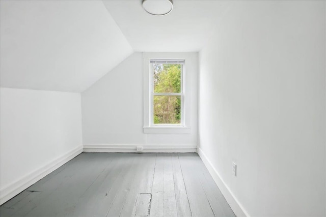 16 Shurtleff Pl, Barre City, VT 05641 - bonus room featuring vaulted ceiling, baseboards, and hardwood / wood-style floors