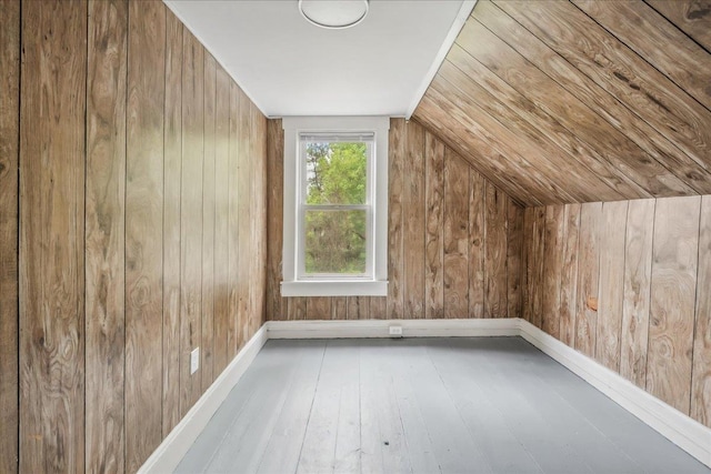 16 Shurtleff Pl, Barre City, VT 05641 - additional living space featuring wood-type flooring, baseboards, wooden walls, and lofted ceiling