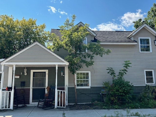 17 Convent Sq, Burlington, VT 05401 - view of front of property featuring a shingled roof and a porch