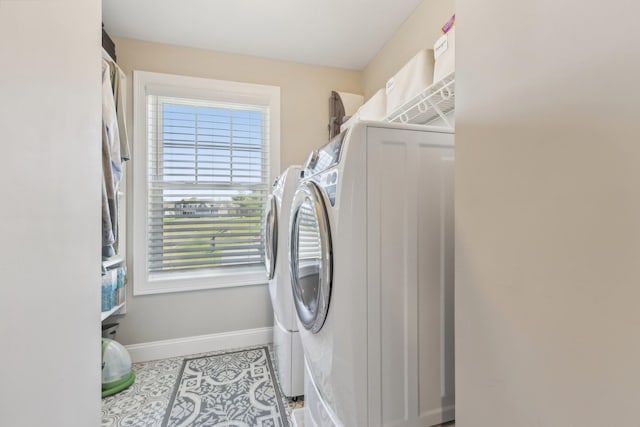 222 Standish Ln, Hudson, NH 03051 - laundry room featuring washer and dryer, baseboards, and tile patterned flooring