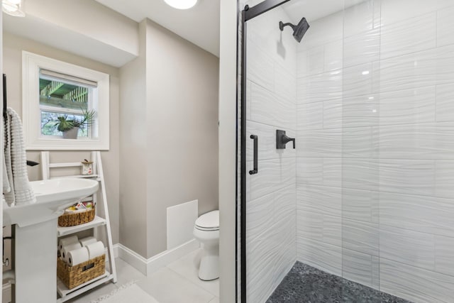 222 Standish Ln, Hudson, NH 03051 - full bathroom featuring a stall shower, toilet, and baseboards