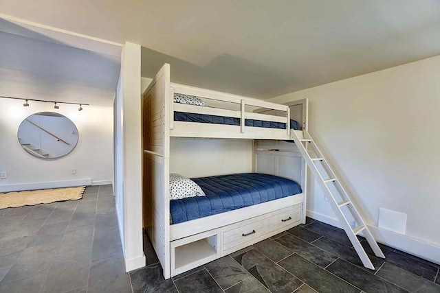 797 Ocean Blvd, Rye, NH 03870 - bedroom with track lighting and baseboards