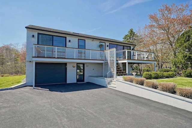 797 Ocean Blvd, Rye, NH 03870 - multi unit property featuring stairway, an attached garage, and asphalt driveway