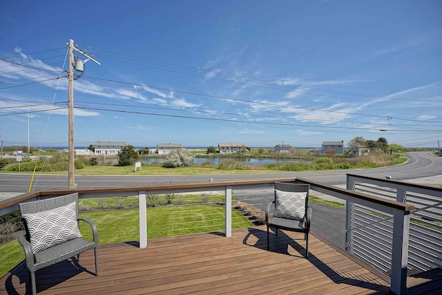 797 Ocean Blvd, Rye, NH 03870 - wooden deck featuring a water view and a yard