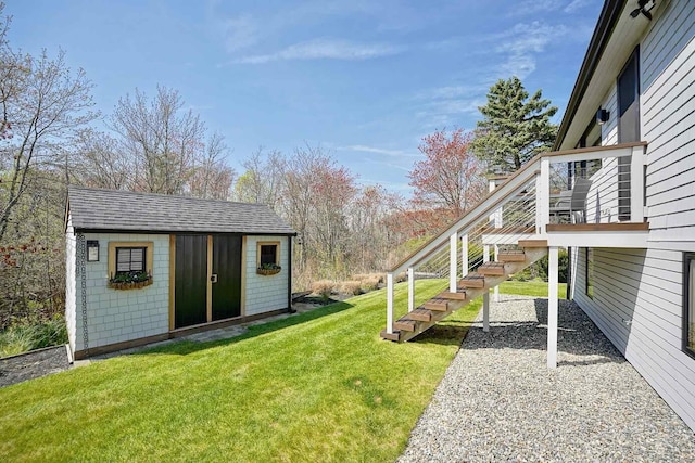 797 Ocean Blvd, Rye, NH 03870 - view of grassy yard featuring an outdoor structure, stairs, and a deck
