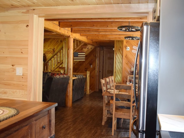 42 Chickadee Ln, Littleton, NH 03561 - dining area featuring wooden ceiling, wood walls, and dark wood-style floors