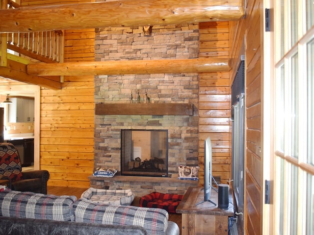 42 Chickadee Ln, Littleton, NH 03561 - living area featuring wood walls, wood finished floors, and a fireplace