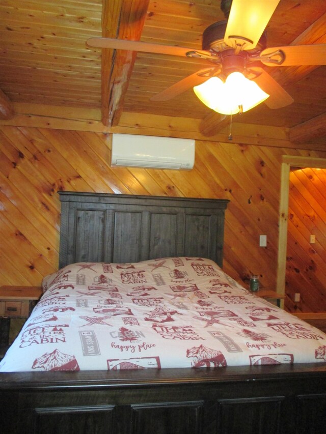 42 Chickadee Ln, Littleton, NH 03561 - bedroom featuring a wall mounted air conditioner, wood walls, wooden ceiling, and beam ceiling
