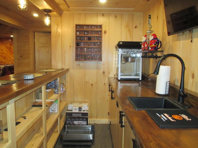 42 Chickadee Ln, Littleton, NH 03561 - kitchen featuring wood counters, a sink, and wooden walls