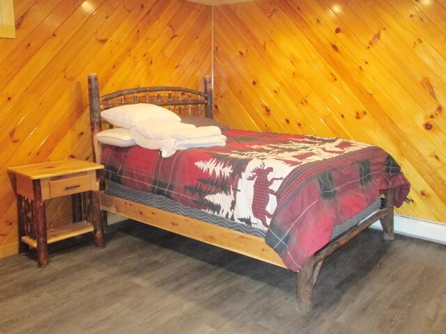 42 Chickadee Ln, Littleton, NH 03561 - bedroom featuring wood finished floors and wooden walls