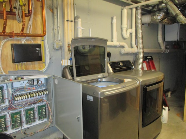 42 Chickadee Ln, Littleton, NH 03561 - washroom featuring washing machine and clothes dryer