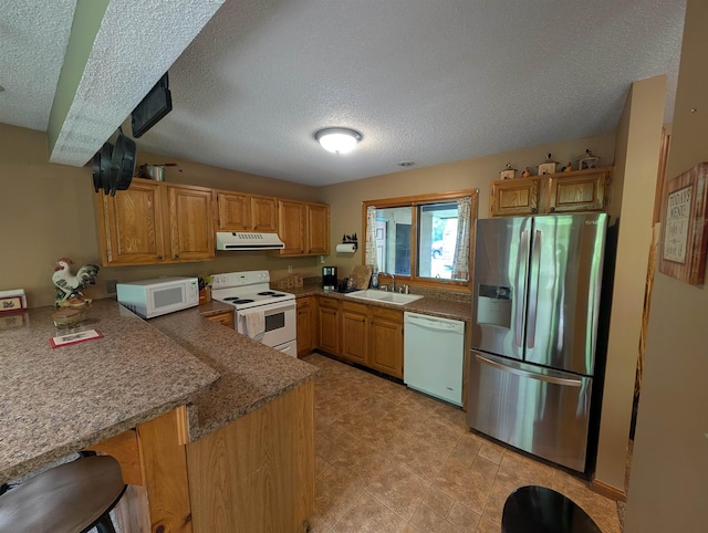 11 Cascade Dr Unit 288, Woodstock, NH 03262 - kitchen with white appliances, ventilation hood, a sink, a peninsula, and a textured ceiling