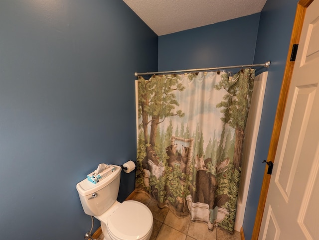 11 Cascade Dr Unit 288, Woodstock, NH 03262 - full bath with tile patterned floors, toilet, and a textured ceiling
