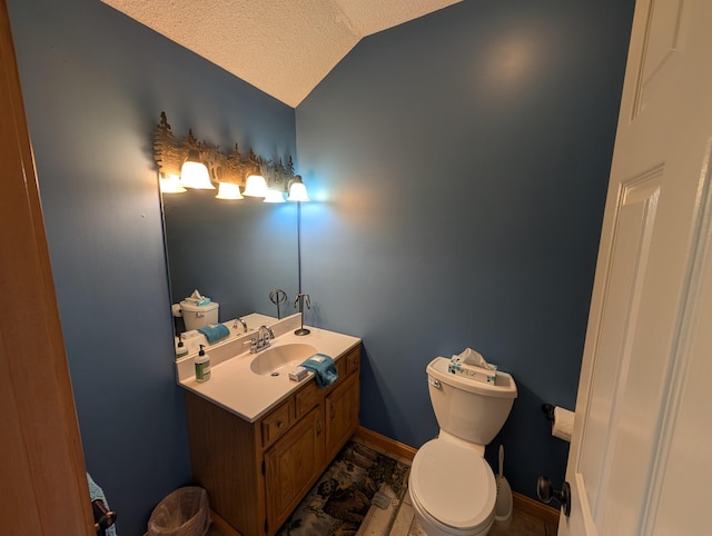 11 Cascade Dr Unit 288, Woodstock, NH 03262 - half bathroom with toilet, lofted ceiling, vanity, baseboards, and a textured ceiling