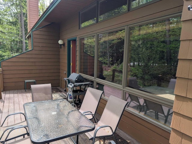 11 Cascade Dr Unit 288, Woodstock, NH 03262 - view of patio / terrace with outdoor dining area, a wooden deck, and area for grilling