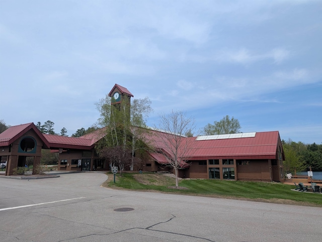 11 Cascade Dr Unit 288, Woodstock, NH 03262 - view of building exterior featuring uncovered parking