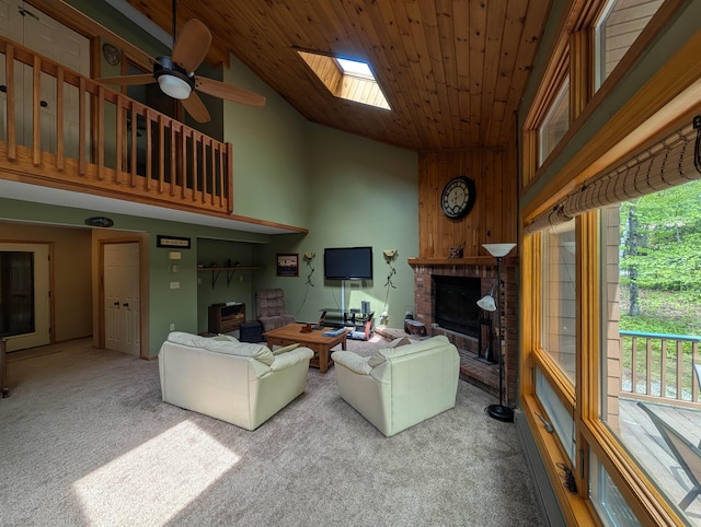 11 Cascade Dr Unit 288, Woodstock, NH 03262 - living room featuring a fireplace, carpet flooring, wooden ceiling, a ceiling fan, and a skylight