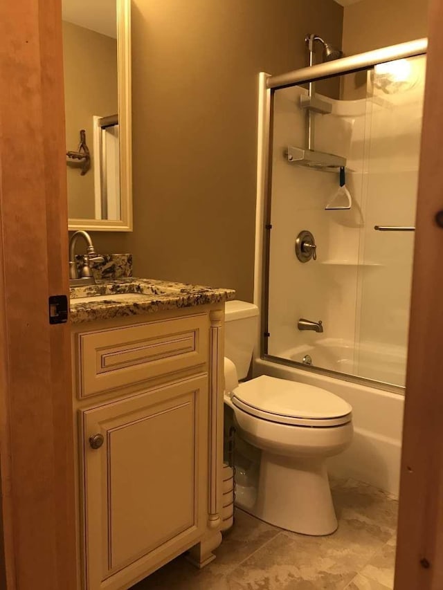 42 Peak Vista Ln, Madison, NH 03849 - bathroom featuring toilet, vanity, and shower / bath combination with glass door