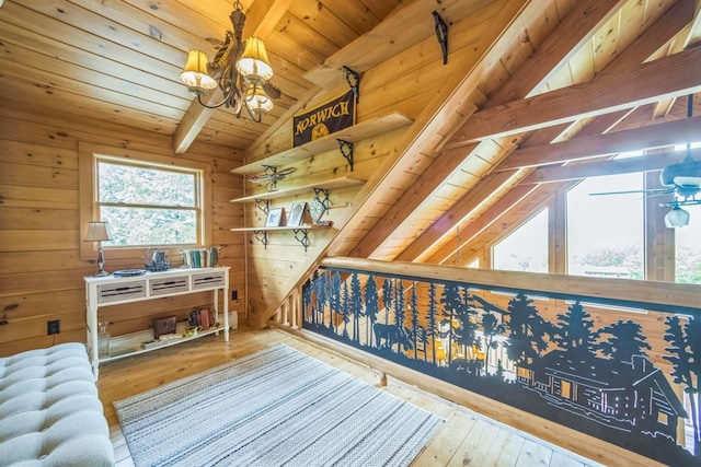 42 Peak Vista Ln, Madison, NH 03849 - living area featuring a chandelier, hardwood / wood-style flooring, wooden walls, and wood ceiling
