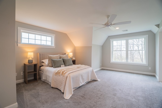 21 Lovering Rd, North Hampton, NH 03862 - carpeted bedroom with multiple windows, ceiling fan, baseboards, and lofted ceiling
