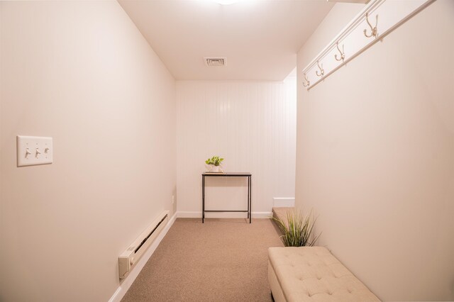 21 Lovering Rd, North Hampton, NH 03862 - corridor with a baseboard radiator, carpet, and baseboards
