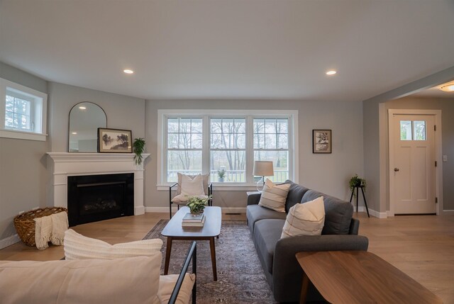 21 Lovering Rd, North Hampton, NH 03862 - living area featuring plenty of natural light, a fireplace, light wood-type flooring, and recessed lighting