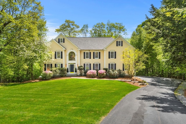 60 Colonel Daniels Dr, Bedford, NH 03110 - colonial inspired home with a front lawn and driveway