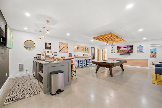 recreation room featuring pool table, recessed lighting, concrete flooring, a sink, and baseboards