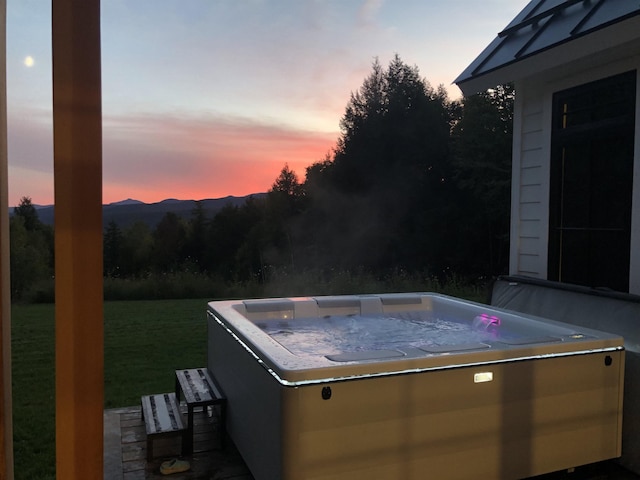 view of patio with a hot tub