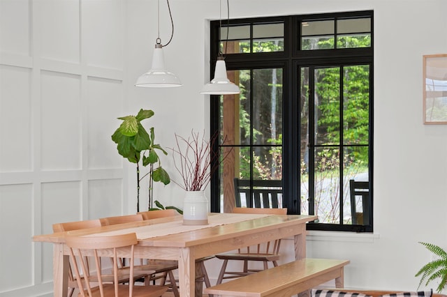 dining space featuring healthy amount of natural light