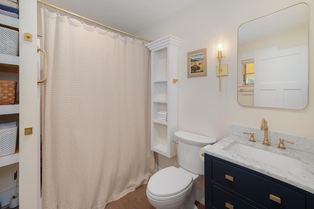 full bathroom with toilet, vanity, and curtained shower