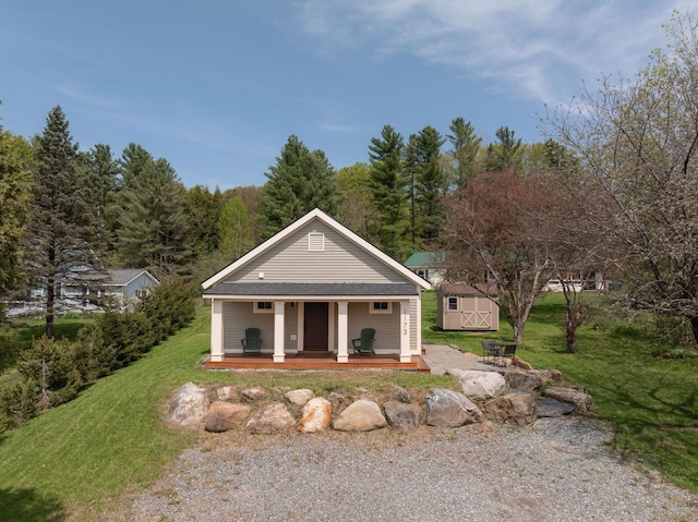 greek revival inspired property featuring a front lawn and a porch