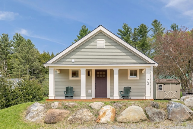 neoclassical / greek revival house featuring covered porch