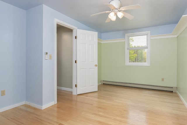 111 Shore Dr, Henniker, NH 03242 - empty room featuring a baseboard radiator, light wood-style flooring, ceiling fan, and baseboards