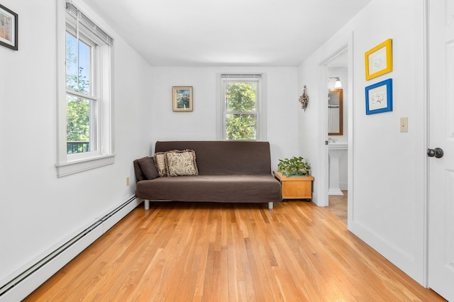 4 Oleary Ave, Hanover, NH 03755 - living area featuring a baseboard radiator, light wood finished floors, and baseboards