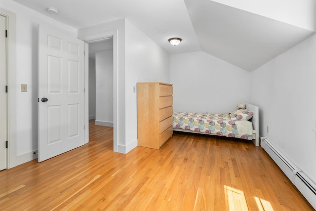 4 Oleary Ave, Hanover, NH 03755 - bedroom featuring a baseboard heating unit, light wood-style flooring, and vaulted ceiling
