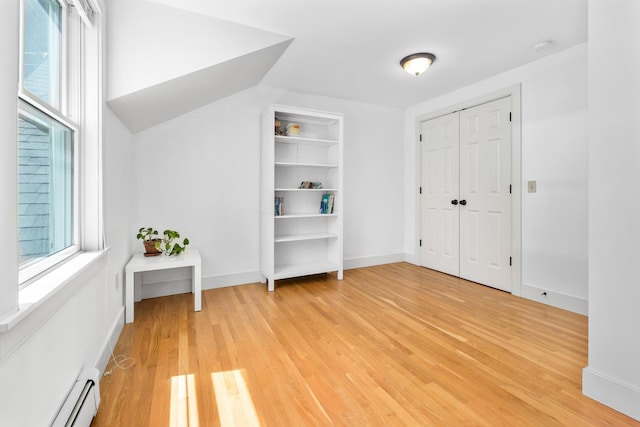 4 Oleary Ave, Hanover, NH 03755 - unfurnished bedroom featuring baseboard heating, multiple windows, light wood-type flooring, and baseboards