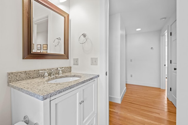 4 Oleary Ave, Hanover, NH 03755 - bathroom featuring wood finished floors, baseboards, vanity, and recessed lighting