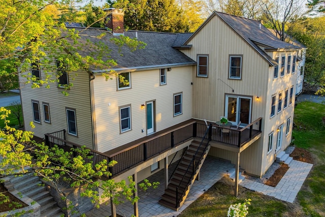 4 Oleary Ave, Hanover, NH 03755 - rear view of property with a patio, a shingled roof, a chimney, a deck, and stairs