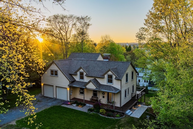 4 Oleary Ave, Hanover, NH 03755 - victorian-style house with roof with shingles, a porch, a lawn, a garage, and asphalt driveway