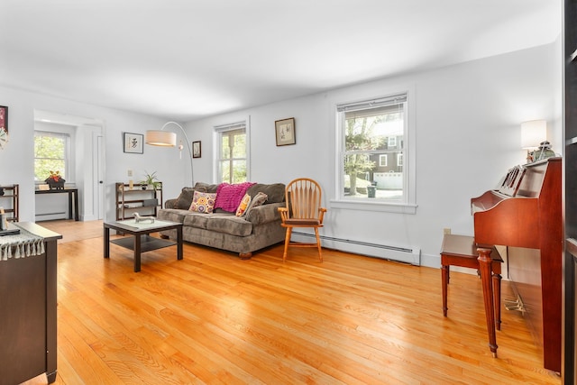 4 Oleary Ave, Hanover, NH 03755 - living area with a baseboard heating unit, healthy amount of natural light, and light wood-type flooring