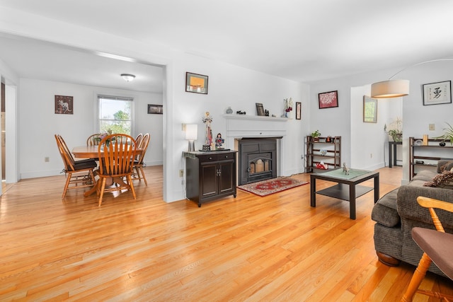 4 Oleary Ave, Hanover, NH 03755 - living area with light wood-style flooring and a fireplace with flush hearth