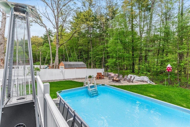 8 Bowman Ct, Merrimack, NH 03054 - swimming pool featuring an outdoor fire pit